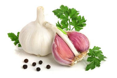 garlic with parsley leaf and peppercorn isolated on white background clipart