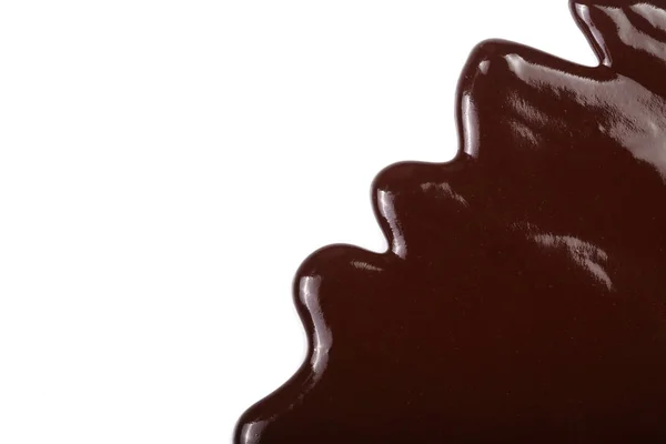 Melted chocolate dripping isolated on white background — Stock Photo, Image
