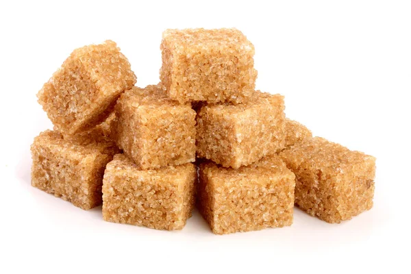 Brown sugar cubes isolated on white background — Stock Photo, Image