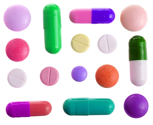 Capsula pillola multicolore isolata su sfondo bianco. Vista dall'alto. Piatto. Set o collezione — Foto Stock