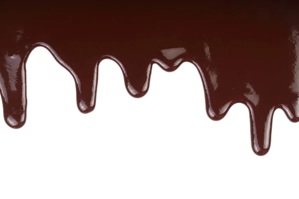 Melted chocolate dripping isolated on white background — Stock Photo, Image