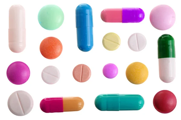 Многоцветная капсула таблетки изолированы на белом фоне. Вид сверху. Плоский лежал. Набор или коллекция — стоковое фото