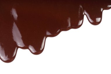 Beyaz arka plan üzerinde izole eritilmiş çikolata damlama