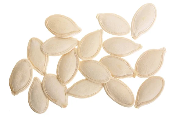 Heap de sementes de abóbora isoladas em fundo branco. Vista superior. Depósito plano — Fotografia de Stock