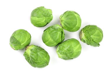 Brüksel lahanası beyaz arka plan closeup izole. Üstten Görünüm. Düz yatıyordu