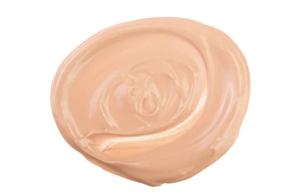 Beige liquid foundation makeup isolated on white background — Stock Photo, Image