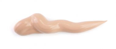 Beyaz arka plan üzerinde izole bej sıvı temel makyaj