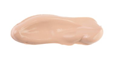 Beyaz arka plan üzerinde izole bej sıvı temel makyaj