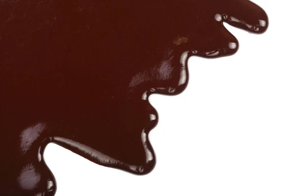 白い背景に分離された溶かされたチョコレート滴下 — ストック写真