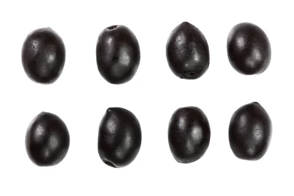 Whole black olives isolated on white background. Top view. Flat lay pattern — Stock Photo, Image