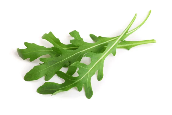Rúcula fresca verde ou folha de arugula isolada no fundo branco macro — Fotografia de Stock