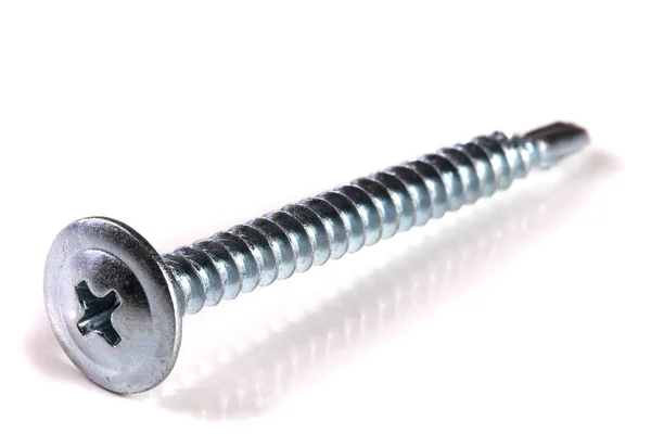 One metal screw isolated on white background closeup — Stock Photo, Image