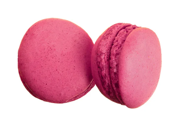 Macaron rosa isolado no fundo branco sem um closeup sombra. Vista superior. Depósito plano — Fotografia de Stock