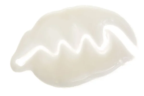 Crema batida o merengue aislado sobre fondo blanco. Vista superior. Puesta plana — Foto de Stock