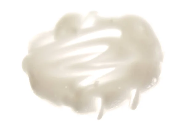 Crema batida o merengue aislado sobre fondo blanco. Vista superior. Puesta plana — Foto de Stock