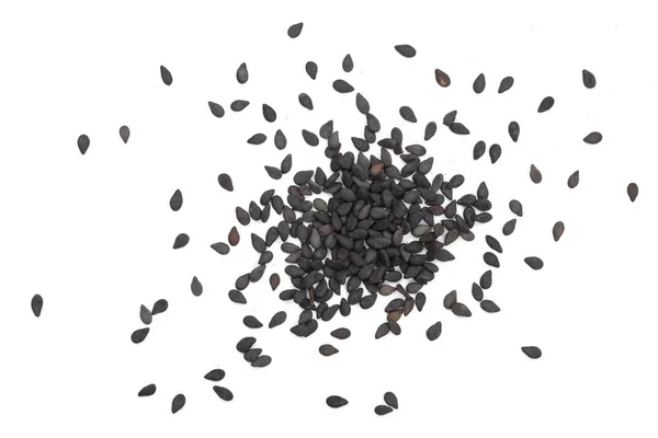 Černá Sezamová semínka izolovaných na bílém pozadí pohled shora — Stock fotografie
