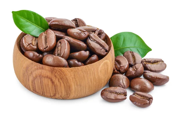 Heap of roasted coffee beans in wooden bowl with leaves isolated on white background. — Stock Photo, Image
