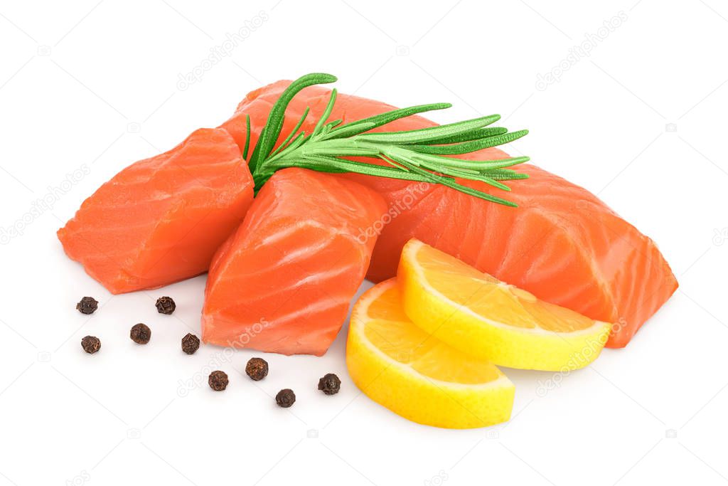 raw salmon piece cube with rosemary, lemon and peppercorn isolated on white background close up