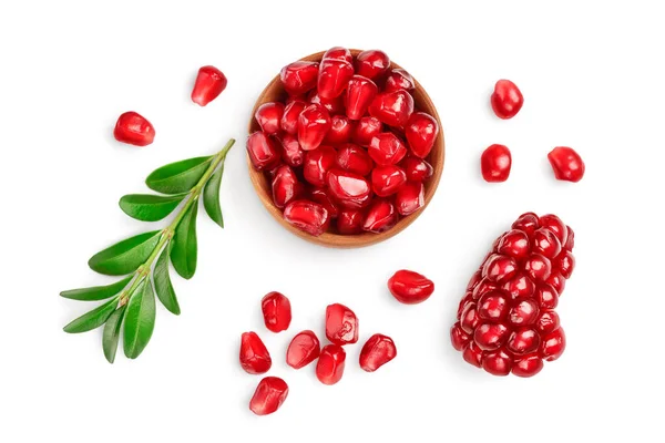 Pomegranate seeds in wooden bowl isolated on white background with clipping path and full depth of field. Top view. Flat lay. — Stock Photo, Image