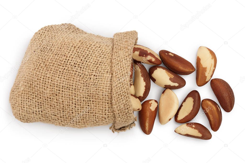 Brasil nuts in sackcloth bag isolated on white background with clipping path and full depth of field. Top view. Flat lay