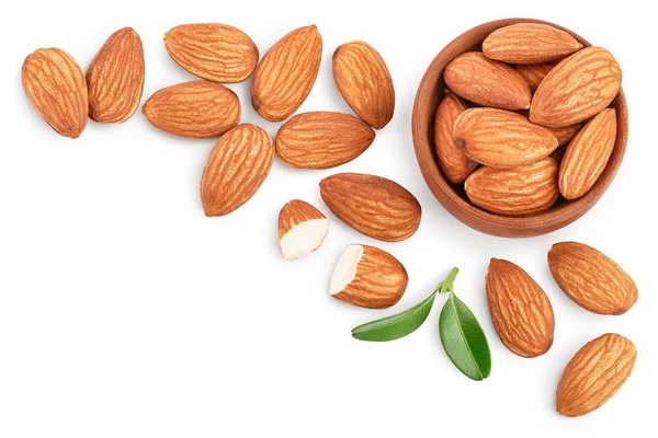 Almonds nuts with leaves isolated on white background with clipping path and full depth of field. Top view with copy space for your text. Flat lay — Stock Photo, Image