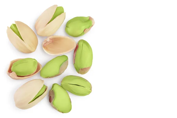 Pistacchio isolato su fondo bianco con percorso di ritaglio e piena profondità di campo. Vista dall'alto con spazio di copia per il testo. Posa piatta — Foto Stock