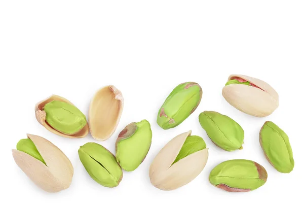 Pistacchio isolato su fondo bianco con percorso di ritaglio e piena profondità di campo. Vista dall'alto con spazio di copia per il testo. Posa piatta — Foto Stock