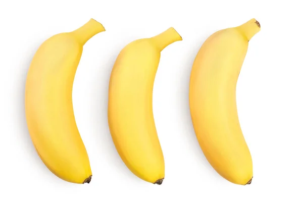 小香蕉在白色背景上被隔离，有切割路径和完整的田野深度。顶部视图。平躺在床上 — 图库照片