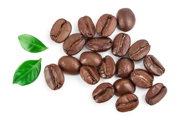 Heap of roasted coffee beans with leaves isolated on white background with clipping path and full depth of field . Top view. Flat lay. — Stock Photo, Image