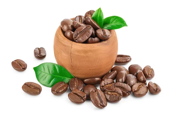 Heap of roasted coffee beans in wooden bowl with leaves isolated on white background with clipping path and full depth of field. — Stock Photo, Image