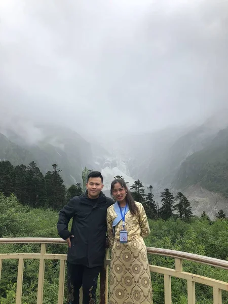 couple in love on mountain landscape