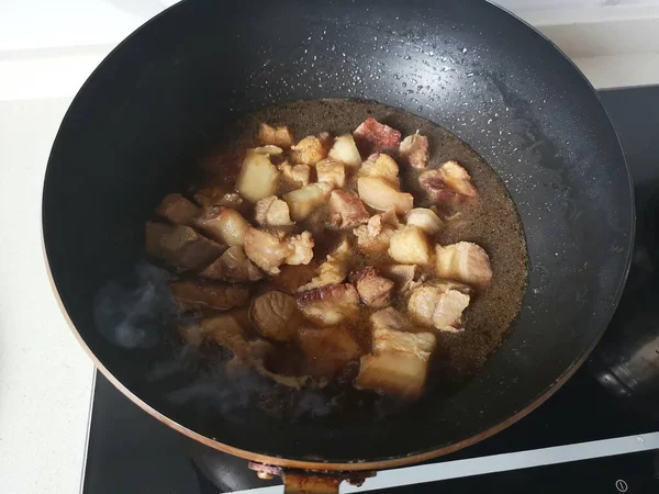 Stock image fried potatoes with onions and vegetables