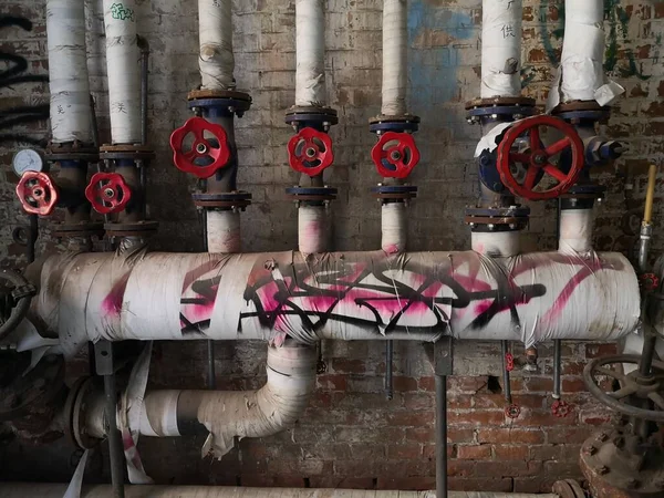 old industrial pipes and valves