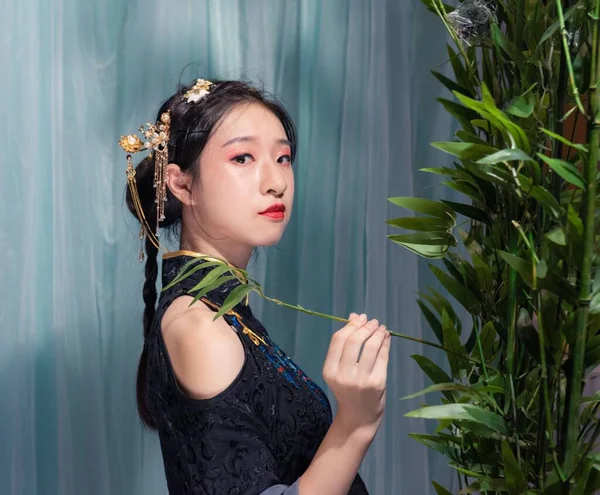 stock image beautiful young woman in a green dress