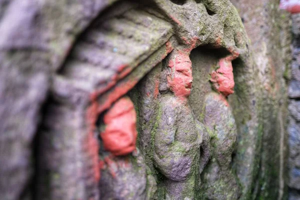 old stone statue in the temple