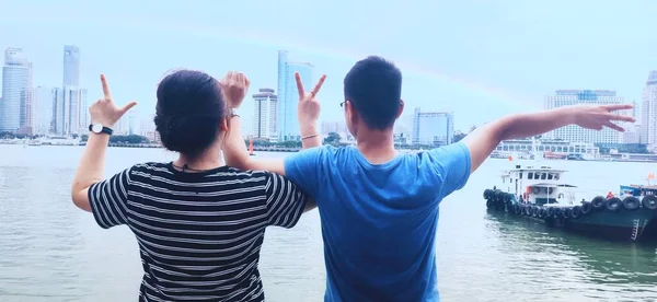 asian couple in love with a ship