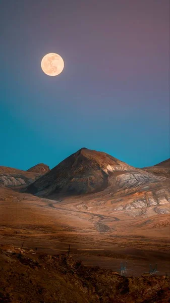 beautiful landscape with a moon and a mountain range