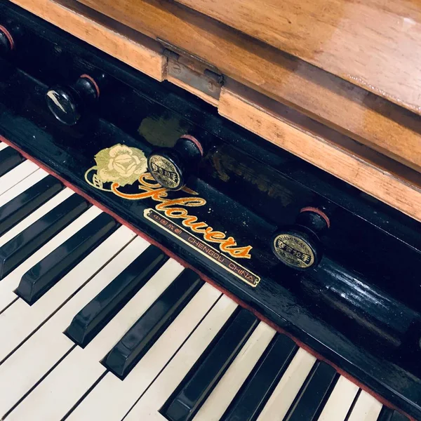 old piano keyboard with a vintage keys