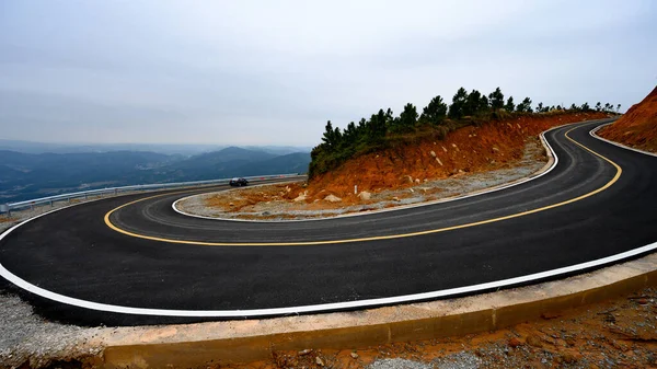 stock image asphalt road in the mountains