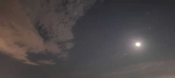 stock image beautiful night sky with clouds