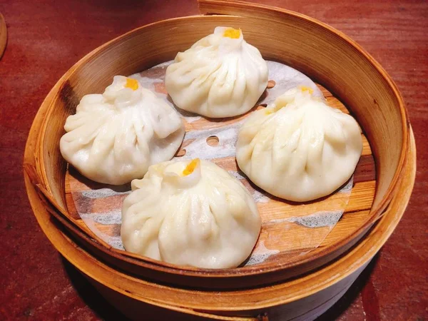 steamed dumpling with dumplings and vegetables