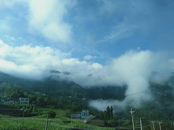 stock image beautiful landscape with a mountain and a cloud