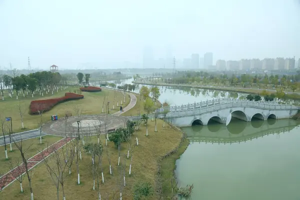 Stock image view of the city of the park in the morning