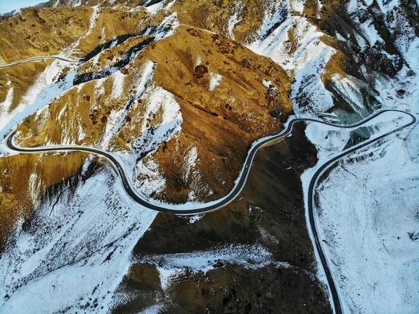 stock image aerial view of the road in the mountains