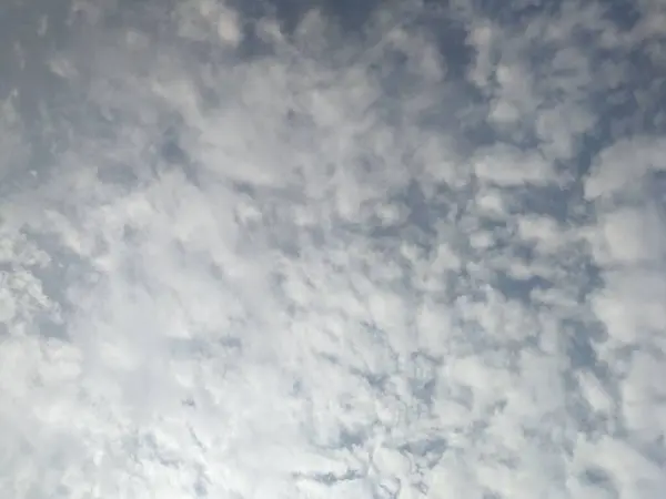 stock image white clouds in the blue sky