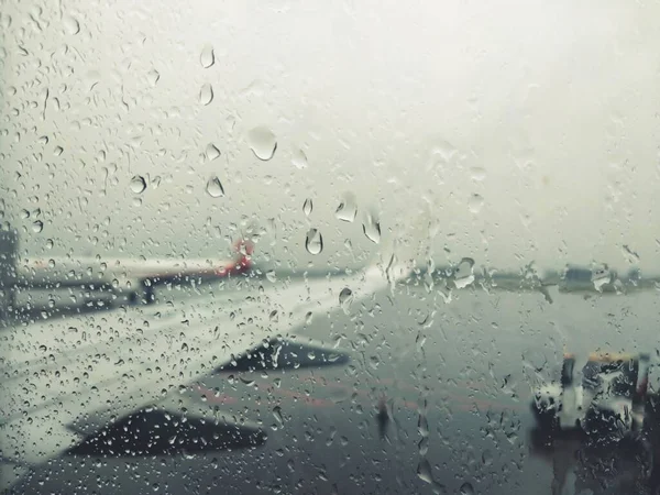 Stock image rain drops on window glass, rainy weather, raindrops on the car, blurred background