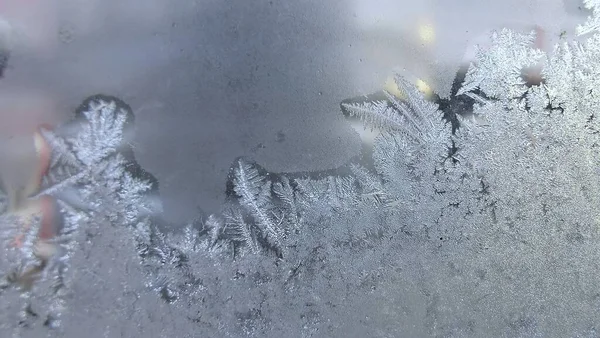 frosty glass with snow on the window