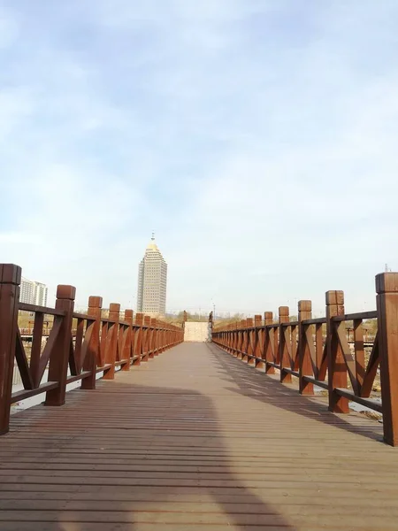 empty wooden bridge and pier in the city