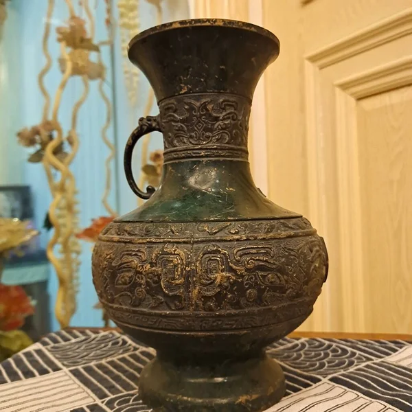 old ceramic vase on the table