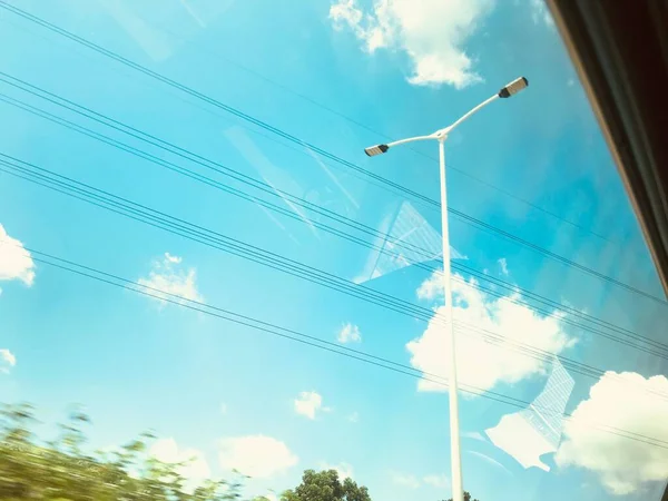 high voltage power lines and blue sky